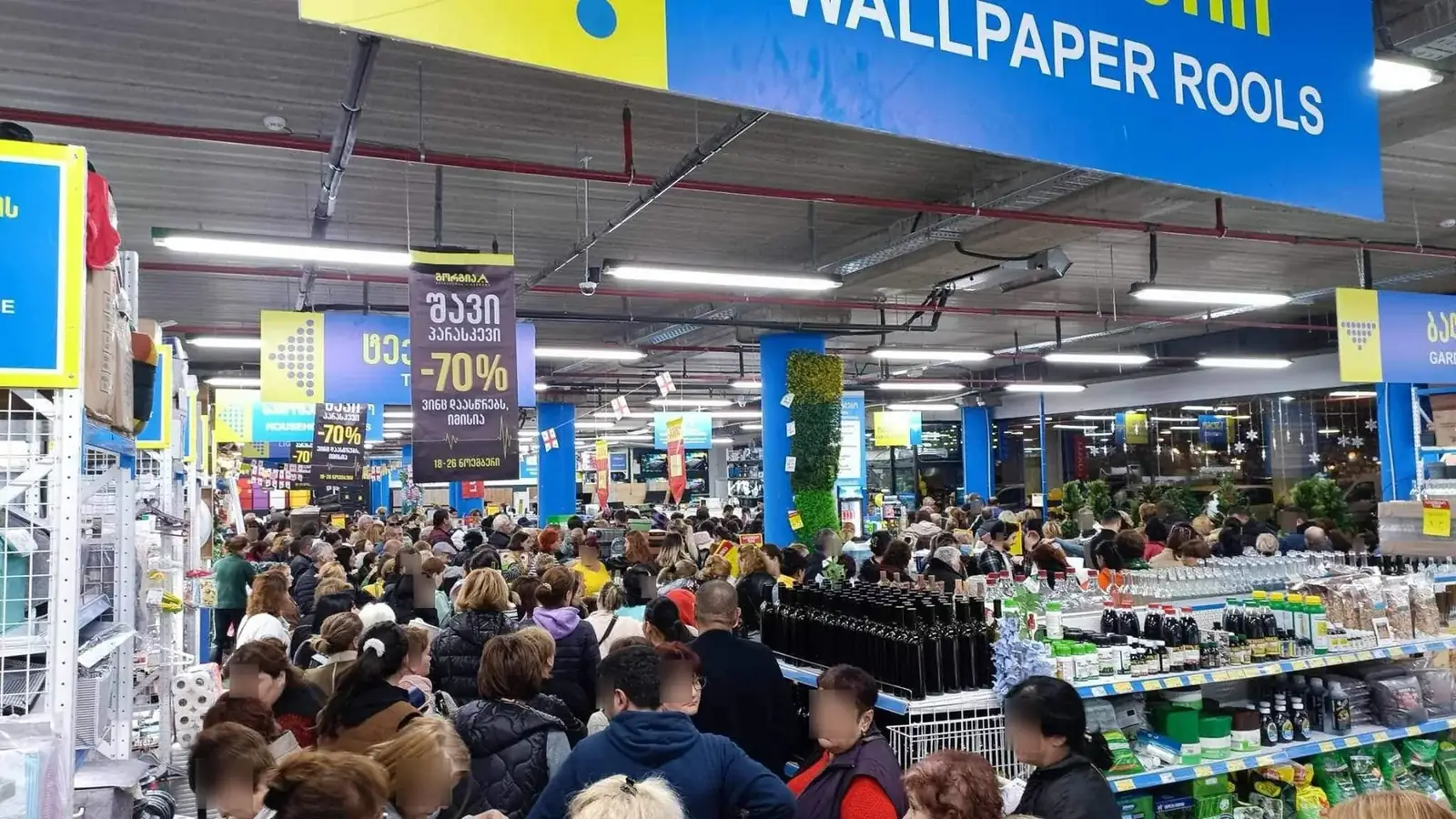 Shoppers filling a Gorgia hypermarket during the Black Friday campaign