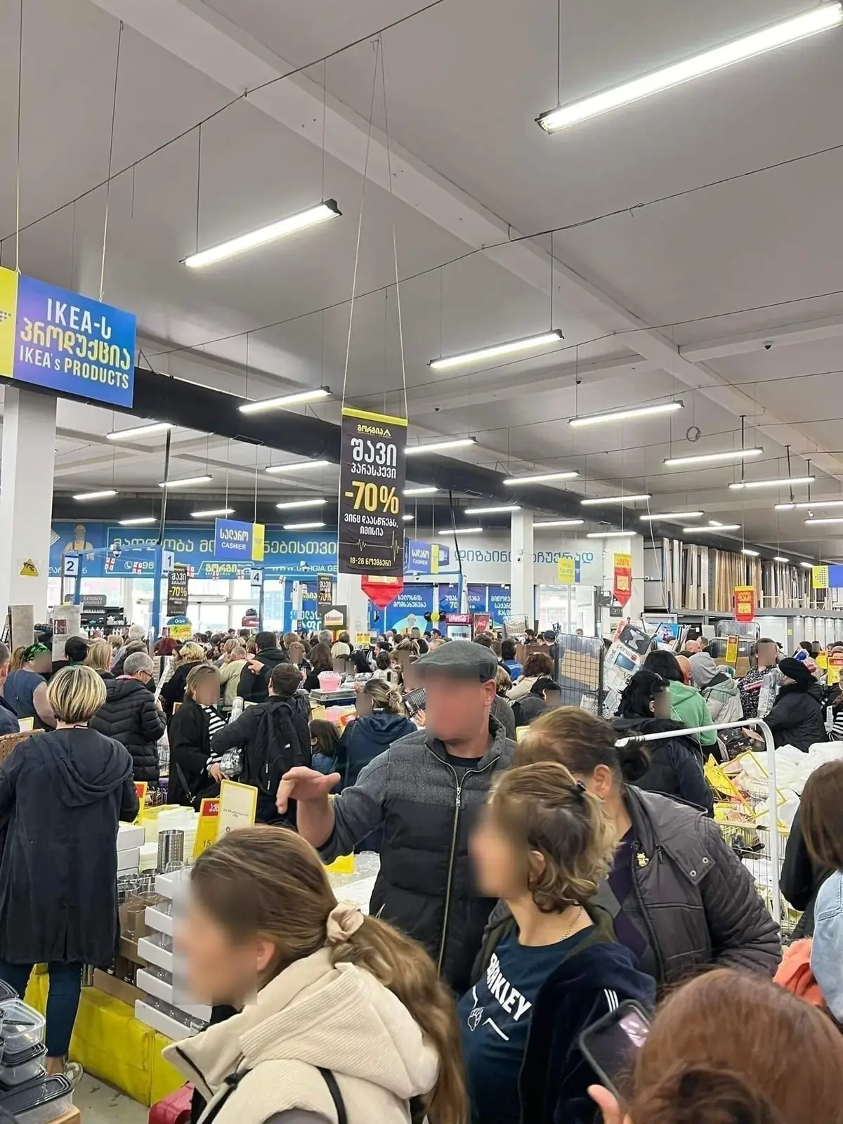 Shoppers at a Gorgia hypermarket
